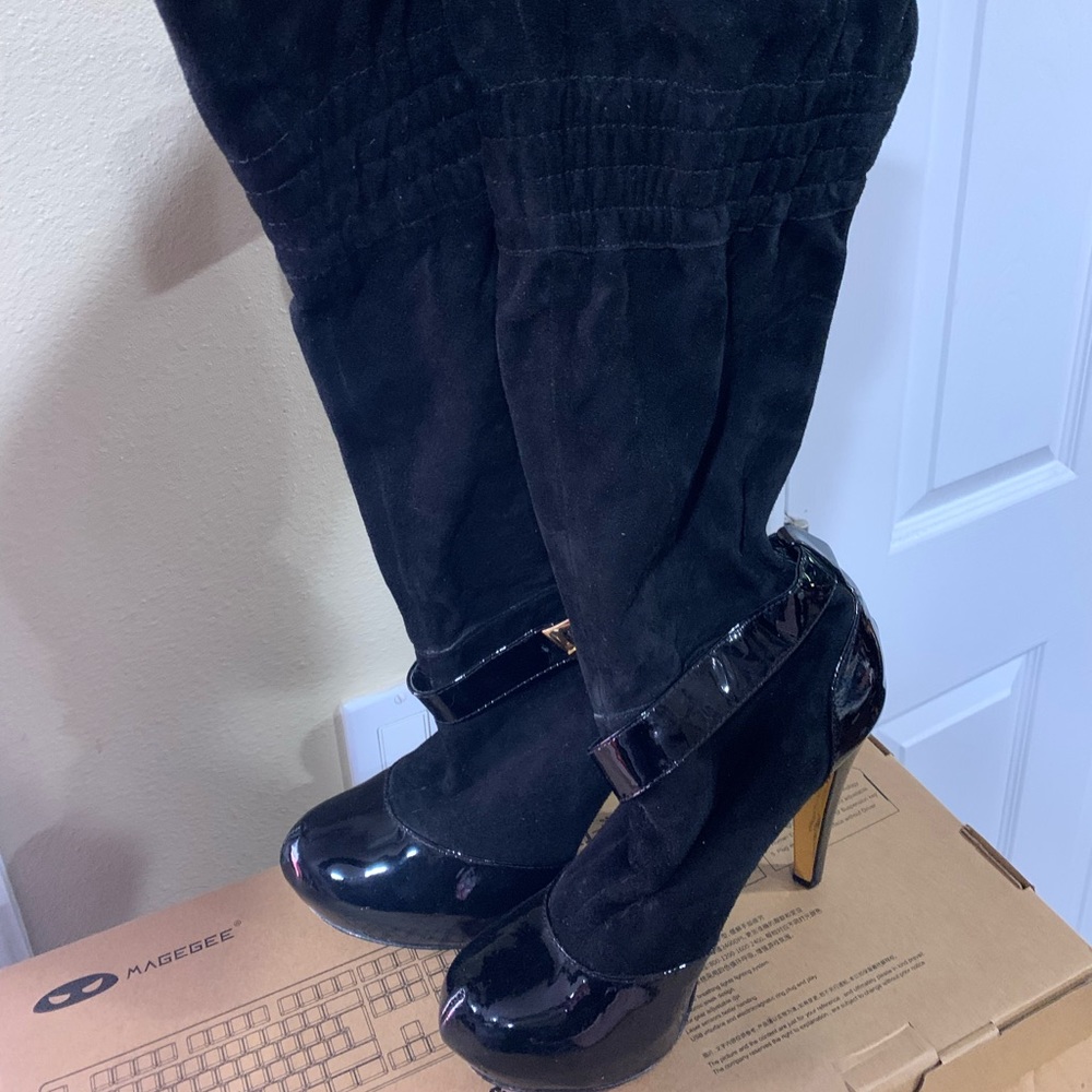Report signature heel boots size 7.5
